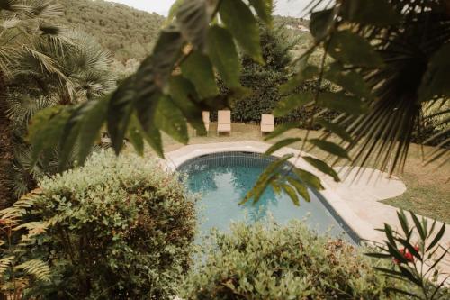 Kolam renang di atau dekat dengan Masía Cal Simó - Casa rural con piscina, cerca de Sitges, para celebraciones y eventos
