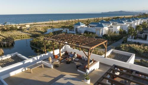 an aerial view of a resort with the beach at Banyan Tree Tamouda Bay in Fnidek