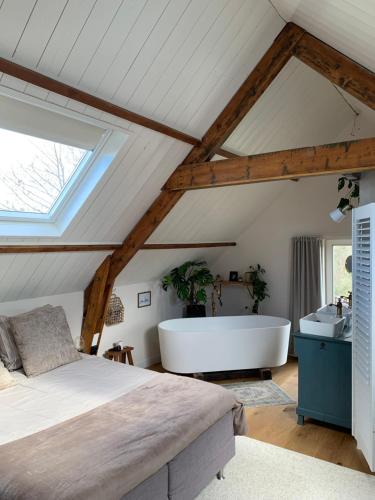 Posezení v ubytování B&B De Vrijbuiter