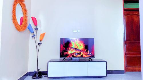TV a/nebo společenská místnost v ubytování TM39 homes