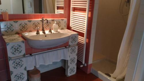 Koupelna v ubytování B&B Le Ripe