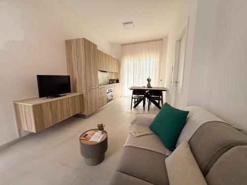 TV a/nebo společenská místnost v ubytování Residence Rosalba