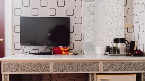 TV a/nebo společenská místnost v ubytování Tong Hsin Hotel