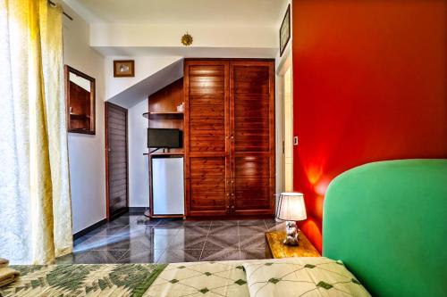 Μια τηλεόραση ή/και κέντρο ψυχαγωγίας στο B&B Villa Bency