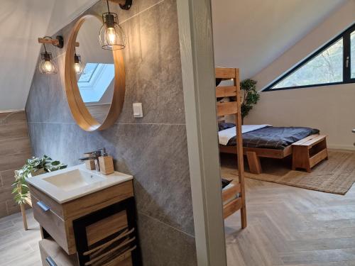 Ένα ή περισσότερα κρεβάτια σε δωμάτιο στο Artizan Chalet