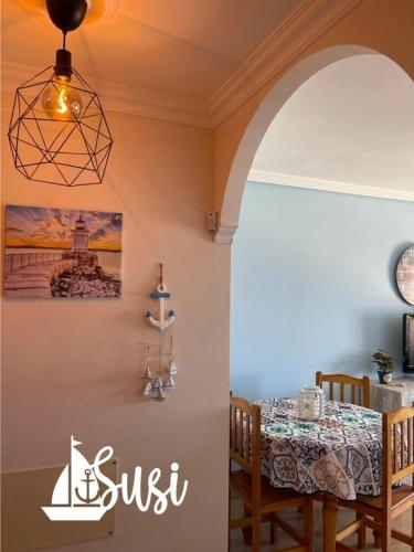 a dining room with a table and a dining room at Susi in Santa Cruz de la Palma