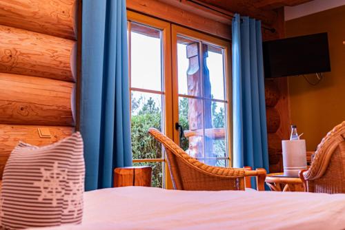 Postel nebo postele na pokoji v ubytování Hus un Köken
