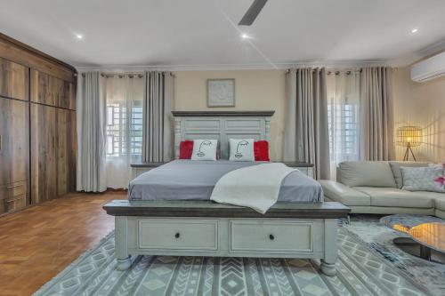 Ένα ή περισσότερα κρεβάτια σε δωμάτιο στο Silver Shells Lifestyle Villa