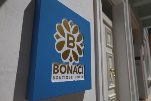 a sign on the side of a building at Bonaci Boutique Hotel in Sliema