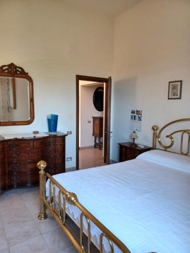 Postel nebo postele na pokoji v ubytování Verde Mare apartment Rosignano Marittimo