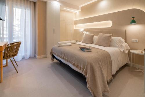 Katil atau katil-katil dalam bilik di WOW APARTAMENTOS VALLADOLID