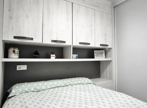 En eller flere senge i et værelse på BS Apartamento Buenavista Playa estancia min 6 noches A 2 minutos de la playa