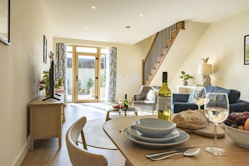 a living room with a table with wine glasses at Solaris in York