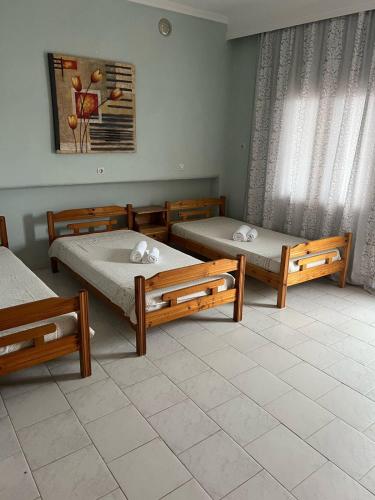 Ένα ή περισσότερα κρεβάτια σε δωμάτιο στο Christos rooms