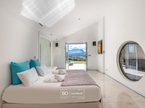 Ένα ή περισσότερα κρεβάτια σε δωμάτιο στο Villa View - Annecy Lake