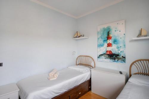 Katil atau katil-katil dalam bilik di Sea Side Home Sanremo vista mare