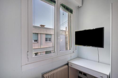 Televisyen dan/atau pusat hiburan di Sea Side Home Sanremo vista mare