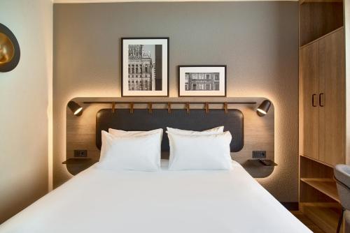 Letto o letti in una camera di CAMPANILE PRIME Warszawa Centrum