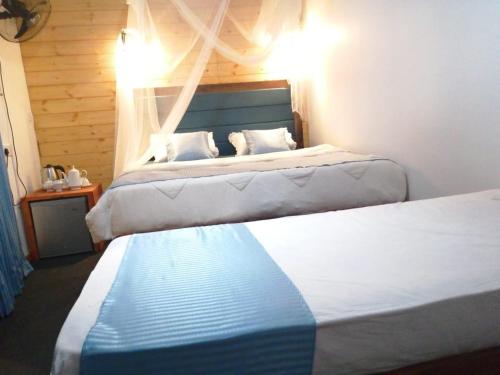 Postel nebo postele na pokoji v ubytování Ella Foret accomodation