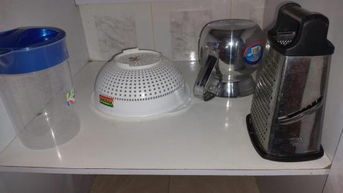a counter with a blender and a toaster on it at Casa de Descanso Zapatoca in Zapatoca