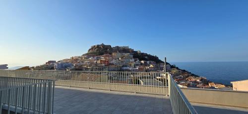 a view of a town on top of a hill at Residenza Albachiara in Castelsardo