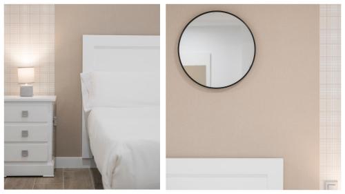 Ένα ή περισσότερα κρεβάτια σε δωμάτιο στο GM Toledo Apartamentos by Toledo AP
