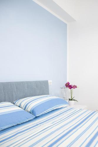 Letto o letti in una camera di Appartamento il Mulino
