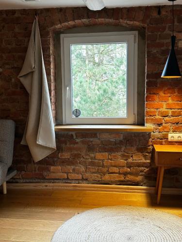 Una cama o camas en una habitación de Dom Cukiernika