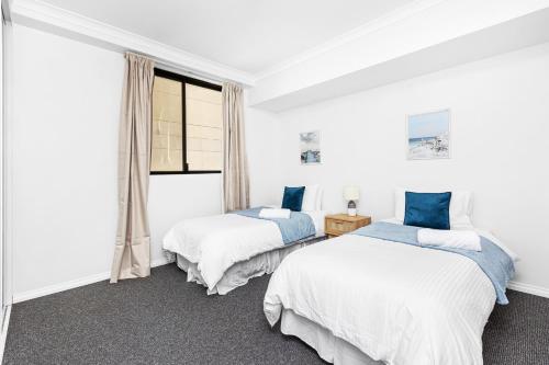 Postel nebo postele na pokoji v ubytování The Petal & Pod - 2 Bdr