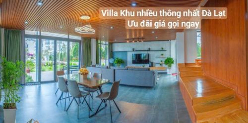 a kitchen and dining room with a table and chairs at Chillin Villa - Biệt Thự Đà Lạt Khu Nhiều Thông Gần Hồ Tuyền Lâm in Xuan An