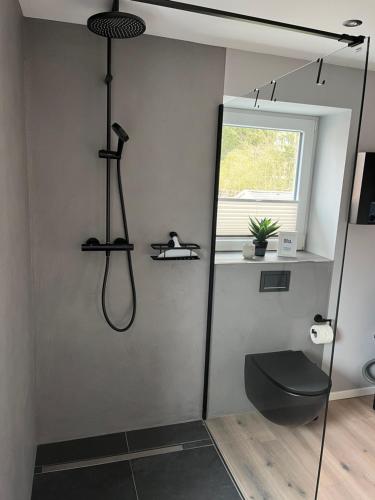 Bilik mandi di Ferienwohnung im Nordseeglück