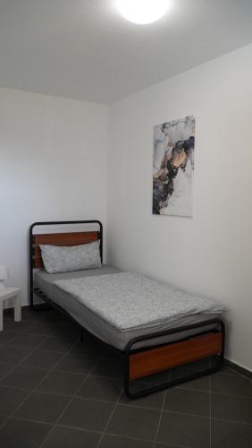 Кровать или кровати в номере MK Apartment Delmenhorst 4 - Free Wifi - Free Parking - nähe HBF