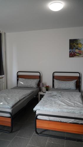 Кровать или кровати в номере MK Apartment Delmenhorst 4 - Free Wifi - Free Parking - nähe HBF