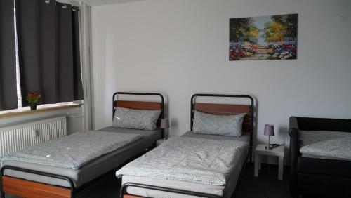 Кровать или кровати в номере MK Apartment Delmenhorst 4 - Free Wifi - Free Parking - nähe HBF