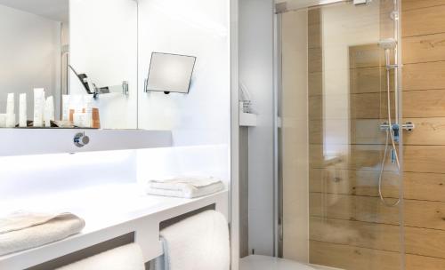 Koupelna v ubytování Hôtel B55
