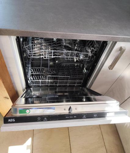 an oven with its door open with its racks at Seeblick Imperia in Konstanz