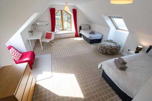Postel nebo postele na pokoji v ubytování 4 Eas Brae Apartment
