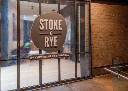 a store window with a sign that reads stroke andyrne at Westin #215 A- 1 Bedroom in Avon