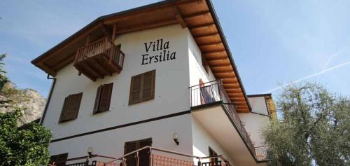 a building with a sign on the side of it at Villa Ersilia in Limone sul Garda