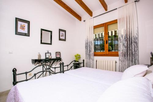 Katil atau katil-katil dalam bilik di Serene Stay in Benissa