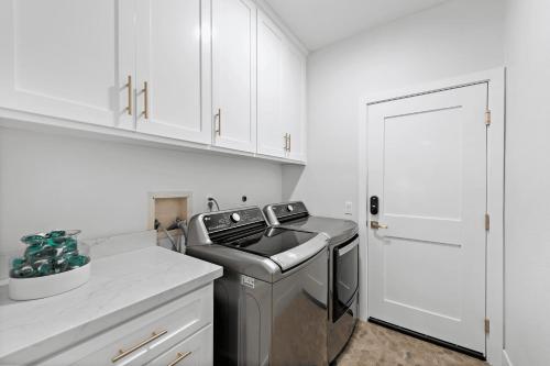 a kitchen with a sink and a dishwasher at Backyard Oasis w Fire Table Walk to Salt Creek Beach Dana Point Dreams in Dana Point