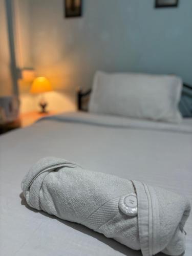 a close up of a bed in a bedroom at Sparid Inn in Darjeeling