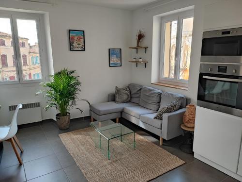 Kuchyň nebo kuchyňský kout v ubytování Joli appartement dans un village provençal à 5 mn de Marseille