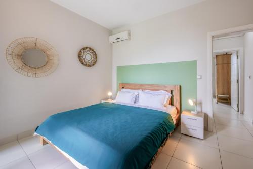 Voodi või voodid majutusasutuse Sea view apartment toas