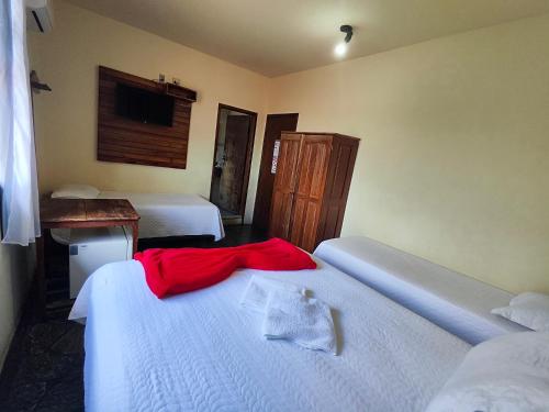 Katil atau katil-katil dalam bilik di Hotel Montanhas de Minas