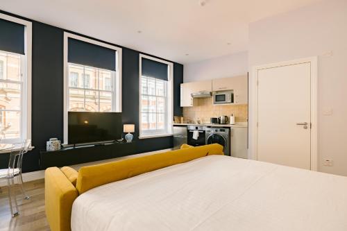 Ένα ή περισσότερα κρεβάτια σε δωμάτιο στο Leicester Square Studios