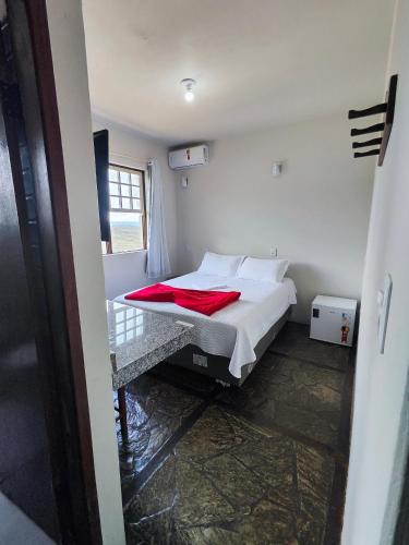 Katil atau katil-katil dalam bilik di Hotel Montanhas de Minas