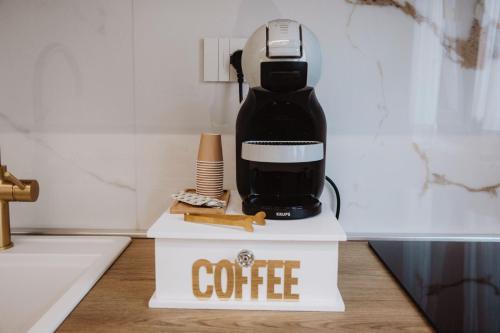 a coffee maker sitting on top of a counter at Camilla Luxury Home in Nemi