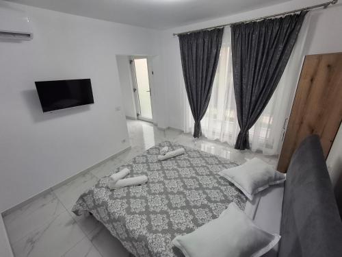Postel nebo postele na pokoji v ubytování Casa Niko