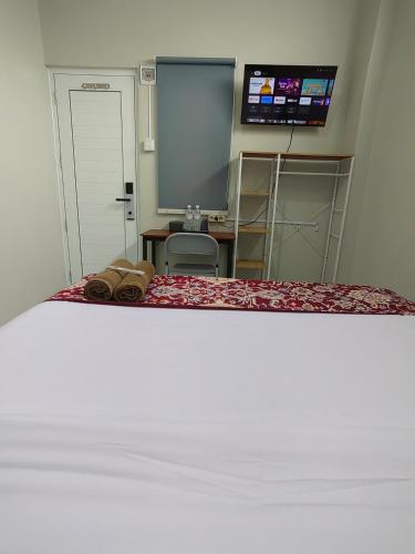 Cama o camas de una habitación en Joy Hotel